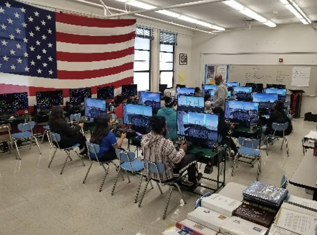Students and an educator working together in a STEMPilot classroom